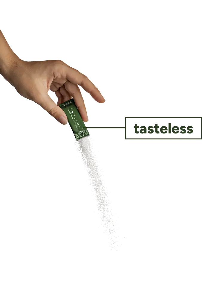 Hand pouring FODZYME from a packet